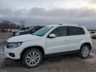 2014 Volkswagen Tiguan SE z VIN WVGAV3AX1EW584122, wystawiony jako Copart lot #85267124 z przebiegiem 132 883 mil mil oraz Szkoda całkowita • Salvage title. Historia ofert i sprzedaży dostępna na DreamBid. Obrazek 1.
