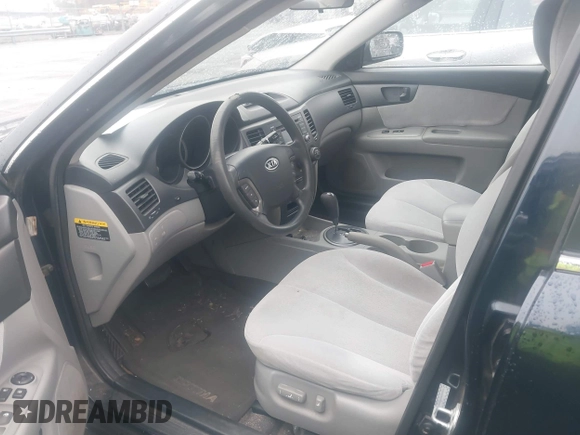 2009 Kia Optima LX z VIN KNAGE228095303047, wystawiony jako IAAI lot #41128475 z przebiegiem 165 317 mil mil oraz . Historia ofert i sprzedaży dostępna na DreamBid. Obrazek 5.