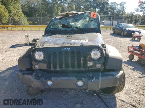 2018 Jeep Wrangler JK Unlimited Sport S with VIN 1C4BJWDG9JL884536, listed as a Copart auction lot 76707124 with 169,277 mi miles and Salvage Title. Bid and sale history available at carsss.com. Image 5.