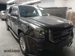 2018 GMC Yukon XL SLT Standard Edition with VIN 1GKS2JKCXJR376058, listed as a IAAI auction lot 41507544 with 110,299 mi miles. Bid and sale history available at carsss.com. Image 1.