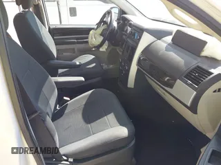 2010 Dodge Grand Caravan SXT with VIN 2D4RN5D1XAR462150, listed as a IAAI auction lot 41466381 with 204,531 mi miles and . Bid and sale history available at DreamBid. Image 5.