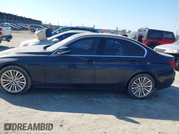 2014 BMW 3 Series 335i with VIN WBA3A9C54EF477943, listed as a IAAI auction lot 41632554 with 102,273 mi miles. Bid and sale history available at carsss.com. Image 14.
