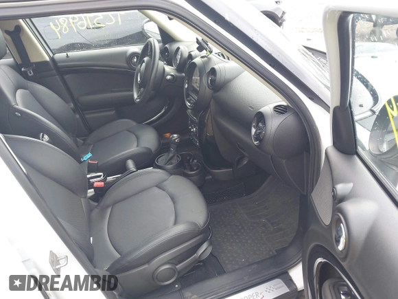 2014 MINI Countryman S z VIN WMWZC5C5XEWP37470, wystawiony jako IAAI lot #42396984 z przebiegiem 77 847 mil mil oraz . Historia ofert i sprzedaży dostępna na DreamBid. Obrazek 5.