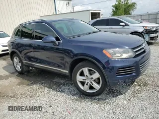 2013 Volkswagen Touareg Lux с VIN WVGEF9BP0DD002456, выставлен на аукционе Copart как лот 56034435 с пробегом 131 412 миль миль и Списание • Salvage title. История ставок и продаж доступна на DreamBid. Изображение 14.