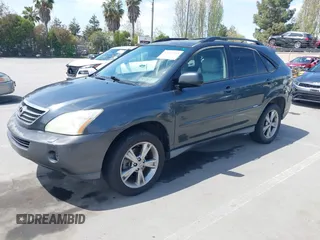 2007 Lexus RX 400h with VIN JTJGW31U372001817, listed as a IAAI auction lot 42047143 with 155,767 mi miles and . Bid and sale history available at DreamBid. Image 2.