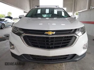 2018 Chevrolet Equinox LT z VIN 3GNAXJEV2JL285919, wystawiony jako IAAI lot #42417524 z przebiegiem 79 402 mil mil oraz . Historia ofert i sprzedaży dostępna na DreamBid. Obrazek 12.
