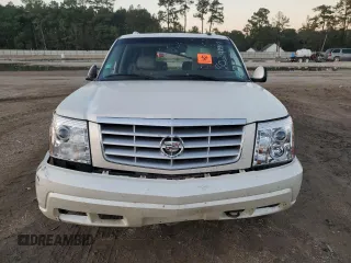 2003 Cadillac Escalade z VIN 1GYEC63T63R139405, wystawiony jako Copart lot #88884095 z przebiegiem Nie podano mil oraz Szkoda całkowita • Salvage title. Historia ofert i sprzedaży dostępna na DreamBid. Obrazek 5.