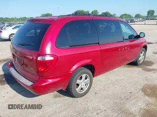 2005 Dodge Caravan SXT with VIN 2D4GP44L05R552278, listed as a IAAI auction lot 42582873 with 131,887 mi miles and . Bid and sale history available at DreamBid. Image 4.