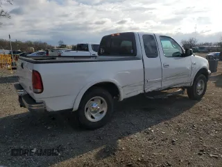 2000 Ford F-150 XL with VIN 2FTRX18L2YCA44464, listed as a Copart auction lot 51081335 with Not provided miles and Salvage title. Bid and sale history available at DreamBid. Image 3.