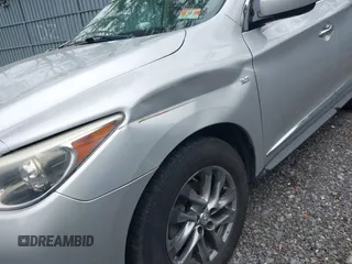 2014 Infiniti QX60 with VIN 5N1AL0MMXEC500998, listed as a IAAI auction lot 42596904 with 105,153 mi miles and . Bid and sale history available at DreamBid. Image 6.