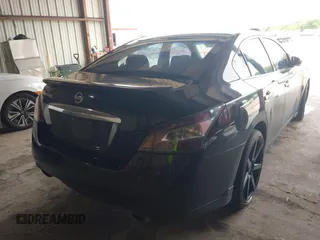 2014 Nissan Maxima S with VIN 1N4AA5AP9EC476138, listed as a IAAI auction lot 42732164 with 105,724 mi miles and . Bid and sale history available at DreamBid. Image 4.