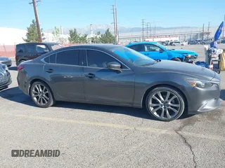 2017 Mazda 6 Grand Touring with VIN JM1GL1W51H1137470, listed as a IAAI auction lot 41872756 with 132,564 mi miles. Bid and sale history available at carsss.com. Image 13.