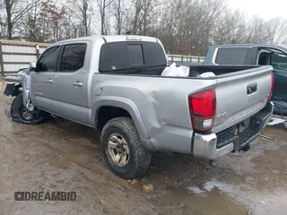 2018 Toyota Tacoma SR with VIN 3TMCZ5AN4JM148581, listed as a IAAI auction lot 41462945 with 115,655 mi miles. Bid and sale history available at carsss.com. Image 3.