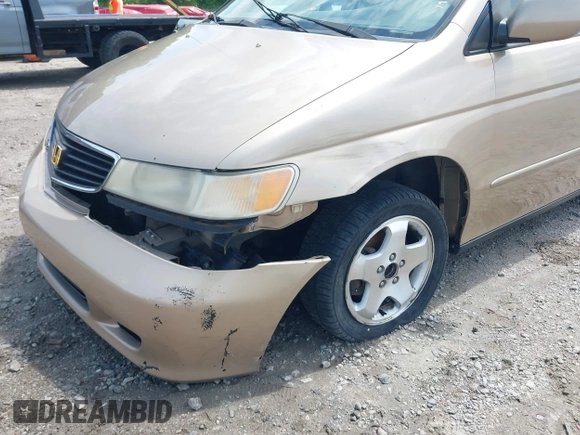 2000 Honda Odyssey EX with VIN 2HKRL1868YH513587, listed as a IAAI auction lot 42092115 with 302,555 mi miles and . Bid and sale history available at DreamBid. Image 6.