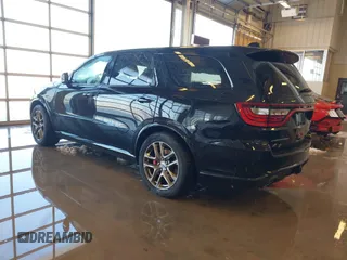 2021 Dodge Durango R/T with VIN 1C4SDJCT1MC788493, listed as a IAAI auction lot 41213673 with 80,287 mi miles and . Bid and sale history available at DreamBid. Image 3.