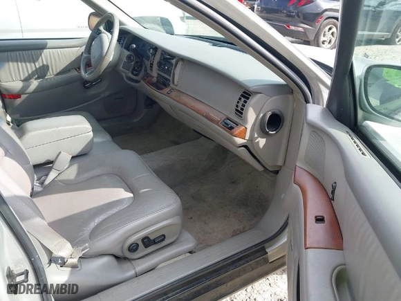1999 Buick Park Avenue with VIN 1G4CW52K1X4641387, listed as a IAAI auction lot 41497762 with 116954 miles. Bid and sale history available at carsss.com. Image 5.