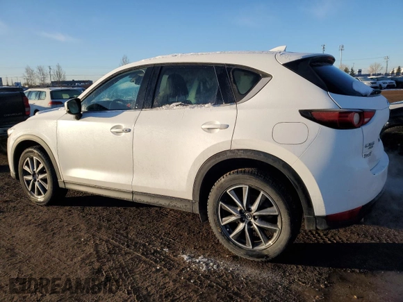 2018 Mazda CX-5 Grand Touring with VIN JM3KFBDM7J0370662, listed as a Copart auction lot 48602585 with 67,875 mi miles and Salvage Title. Bid and sale history available at DreamBid. Image 2.