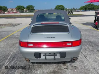 1998 Porsche 911 Carrera with VIN WP0CA2992WS340996, listed as a IAAI auction lot 42002177 with 47,222 mi miles. Bid and sale history available at carsss.com. Image 16.