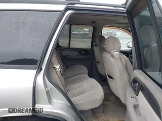 2006 GMC Envoy SLE z VIN 1GKDT13S562187698, wystawiony jako IAAI lot #41808778 z przebiegiem 167 023 mil mil oraz . Historia ofert i sprzedaży dostępna na DreamBid. Obrazek 8.