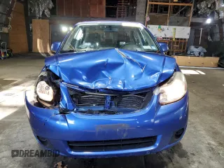 2013 Suzuki SX4 LE with VIN JS2YC5A36D6102850, listed as a Copart auction lot 82205134 with 70,776 mi miles and Salvage Title. Bid and sale history available at carsss.com. Image 5.