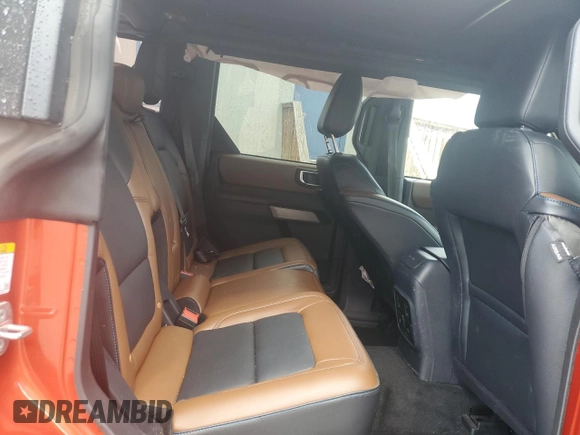 2023 Ford Bronco with VIN 1FMDE5BHXPLB99680, listed as a Copart auction lot 54232455 with 16,579 mi miles and Salvage Title. Bid and sale history available at DreamBid. Image 11.