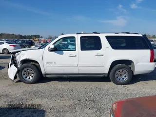 2014 GMC Yukon XL SLT with VIN 1GKS1KE09ER116590, listed as a IAAI auction lot 41459319 with 246,958 mi miles. Bid and sale history available at carsss.com. Image 14.