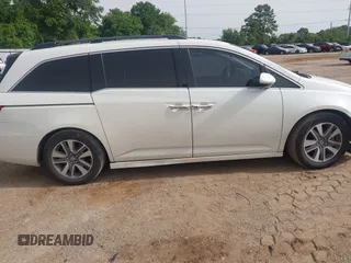 2015 Honda Odyssey Touring Elite with VIN 5FNRL5H96FB045968, listed as a IAAI auction lot 42263637 with 207,637 mi miles and . Bid and sale history available at DreamBid. Image 13.