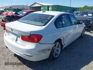 2014 BMW 3 Series 328i with VIN WBA3A5C58EF605108, listed as a IAAI auction lot 42129770 with 169,924 mi miles and . Bid and sale history available at DreamBid. Image 4.