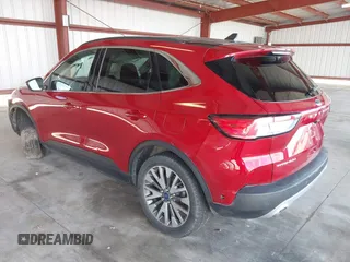 2020 Ford Escape Titanium Hybrid z VIN 1FMCU9DZ1LUC19346, wystawiony jako IAAI lot #41597142 z przebiegiem 75 945 mil mil oraz . Historia ofert i sprzedaży dostępna na DreamBid. Obrazek 3.