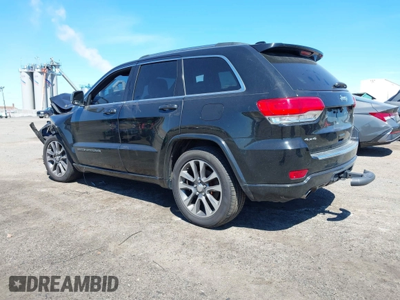 2017 Jeep Grand Cherokee Overland with VIN 1C4RJFCG0HC844713, listed as a IAAI auction lot 42293301 with 83,791 mi miles and . Bid and sale history available at DreamBid. Image 3.