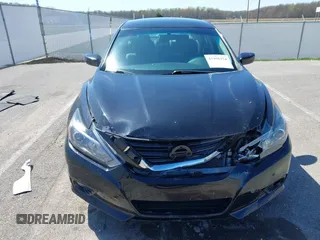 2018 Nissan Altima SV with VIN 1N4AL3AP5JC285843, listed as a IAAI auction lot 41956374 with 100,688 mi miles and . Bid and sale history available at carsss.com. Image 12.