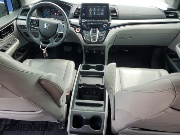 2021 Honda Odyssey Touring z VIN 5FNRL6H85MB039444, wystawiony jako Copart lot #57142205 z przebiegiem 74 228 mil mil oraz Szkoda całkowita • Salvage title. Historia ofert i sprzedaży dostępna na DreamBid. Obrazek 8.