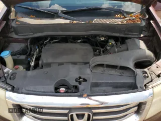 2015 Honda Pilot EX-L z VIN 5FNYF3H53FB030588, wystawiony jako Copart lot #84428534 z przebiegiem 204 831 mil mil oraz Szkoda całkowita • Salvage title. Historia ofert i sprzedaży dostępna na DreamBid. Obrazek 14.