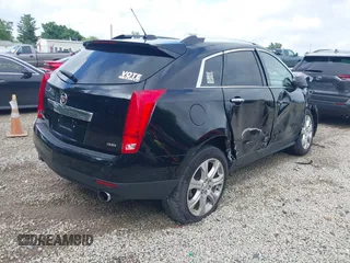 2015 Cadillac SRX Premium Collection z VIN 3GYFNGE36FS626641, wystawiony jako IAAI lot #42532380 z przebiegiem 178 799 mil mil oraz . Historia ofert i sprzedaży dostępna na DreamBid. Obrazek 4.