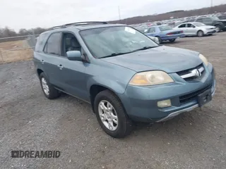 2006 Acura MDX Touring RES w/Navi with VIN 2HNYD18996H511740, listed as a IAAI auction lot 41679575 with 311,192 mi miles. Bid and sale history available at carsss.com. Image 1.