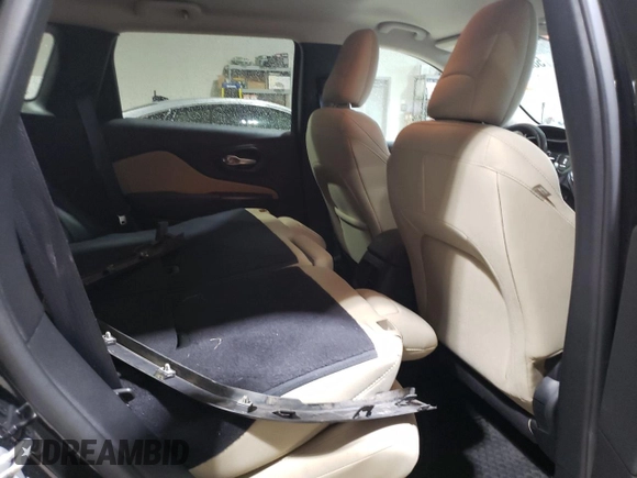 2016 Jeep Cherokee Latitude with VIN 1C4PJMCS5GW191468, listed as a Copart auction lot 58291485 with 106,695 mi miles and Salvage title. Bid and sale history available at DreamBid. Image 11.