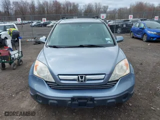2007 Honda CR-V EX-L with VIN JHLRE48737C078883, listed as a IAAI auction lot 41923822 with 113,256 mi miles. Bid and sale history available at carsss.com. Image 12.