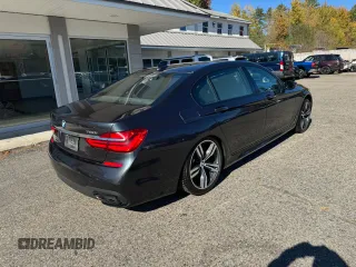 2016 BMW 7 Series 750i with VIN WBA7F0C53GGM20435, listed as a Copart auction lot 77656554 with 186,227 mi miles and Clean Title. Bid and sale history available at carsss.com. Image 4.
