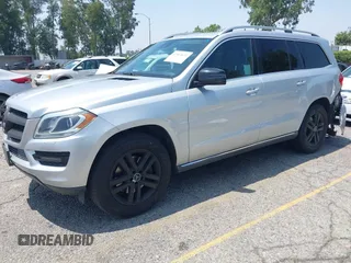 2014 Mercedes-Benz GL 450 z VIN 4JGDF7CE9EA411572, wystawiony jako IAAI lot #42461631 z przebiegiem 121 885 mil mil oraz . Historia ofert i sprzedaży dostępna na DreamBid. Obrazek 2.