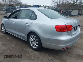 2014 Volkswagen Jetta SE with VIN 3VWD17AJ7EM331139, listed as a IAAI auction lot 41813500 with 110,233 mi miles and . Bid and sale history available at DreamBid. Image 3.