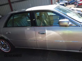 2006 Cadillac DTS w/1SC with VIN 1G6KD57Y46U165978, listed as a IAAI auction lot 41854728 with 116,455 mi miles. Bid and sale history available at carsss.com. Image 13.