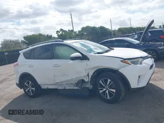 2018 Toyota RAV4 XLE with VIN JTMWFREV7JJ731893, listed as a IAAI auction lot 41567850 with 141,269 mi miles. Bid and sale history available at carsss.com. Image 13.