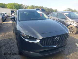 2024 Mazda CX-30 S Select Sport z VIN 3MVDMBBM1RM634542, wystawiony jako IAAI lot #42204673 z przebiegiem 24 694 mil mil oraz . Historia ofert i sprzedaży dostępna na DreamBid. Obrazek 1.