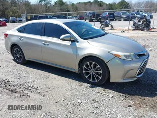 2018 Toyota Avalon XLE with VIN 4T1BK1EB9JU283488, listed as a IAAI auction lot 41777239 with 97,893 mi miles and . Bid and sale history available at DreamBid. Image 1.