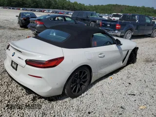 2020 BMW Z4 sDrive30i with VIN WBAHF3C06LWW83982, listed as a Copart auction lot 66076064 with 71,855 mi miles and Salvage Title. Bid and sale history available at carsss.com. Image 3.