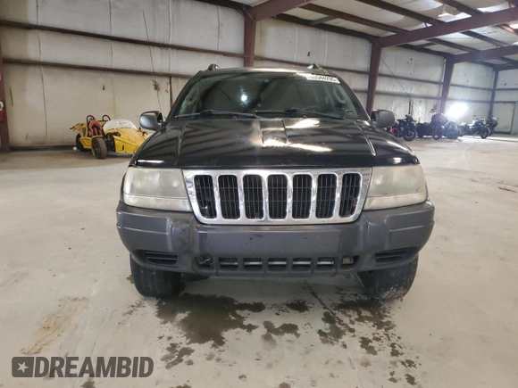 2003 Jeep Grand Cherokee Laredo with VIN 1J4GX48S13C601387, listed as a Copart auction lot 60544295 with 217,485 mi miles and Salvage title. Bid and sale history available at DreamBid. Image 5.