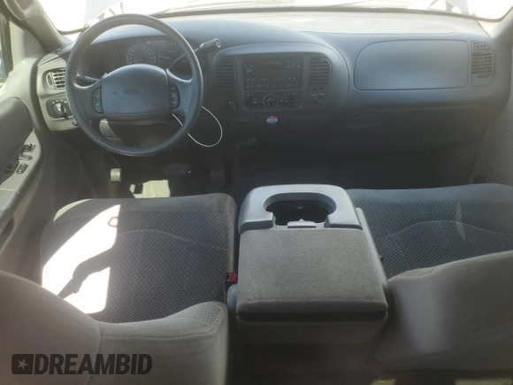 2001 Ford F-150 XL with VIN 1FTRX18L71NA27627, listed as a Copart auction lot 64190715 with 105,503 mi miles and Salvage title. Bid and sale history available at DreamBid. Image 8.
