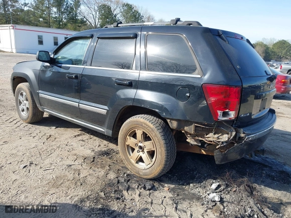 2005 Jeep Grand Cherokee Limited with VIN 1J4HR58245C697913, listed as a IAAI auction lot 41893223 with 255,297 mi miles. Bid and sale history available at carsss.com. Image 3.