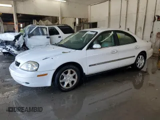 2001 Mercury Sable LS with VIN 1MEFM53U61A623269, listed as a Copart auction lot 64177125 with 137,647 mi miles and Salvage title. Bid and sale history available at DreamBid. Image 1.