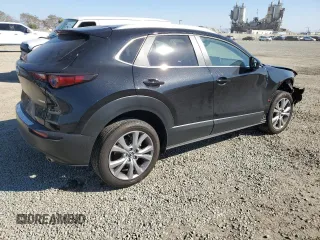 2023 Mazda CX-30 S Carbon Edition with VIN 3MVDMBCM8PM567157, listed as a Copart auction lot 46954865 with 20,038 mi miles and Salvage Title. Bid and sale history available at DreamBid. Image 3.